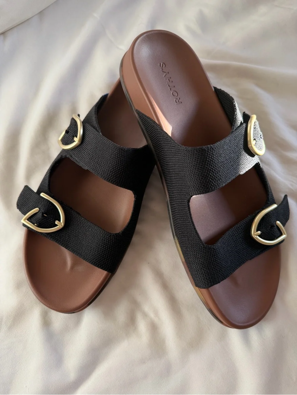 Rothy's Black The Buckle Slide Sandals with Brown Footbed